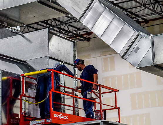 contractor working on hvac duct work