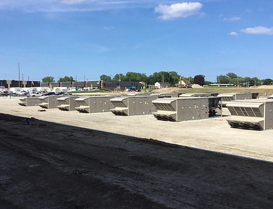 several hvac systems laying on the ground