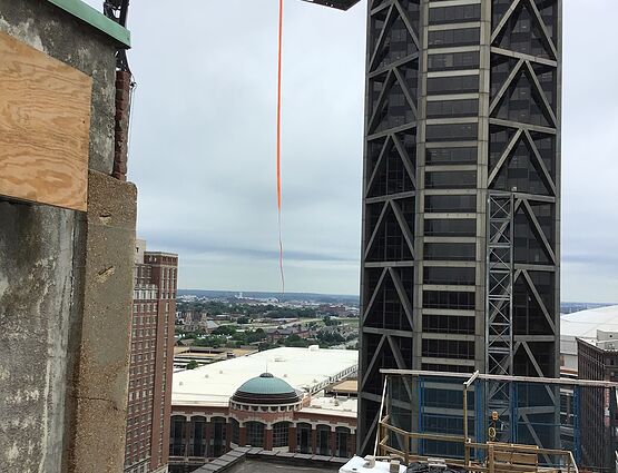 hvac system being lifted by crane